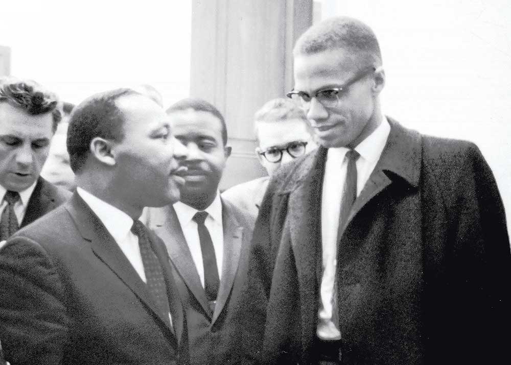 Genius: MLK/X on National Geographic. Pictured: Martin Luther King, Jr. and Malcolm X