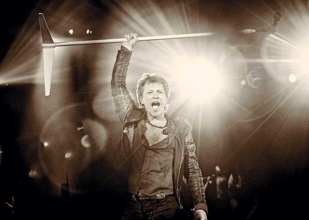 Thank You, Goodnight: The Bon Jovi Story on Disney+. Pictured: Jon Bon Jovi onstage at the Bryce Jordan Center in State College, Pennsylvania in February 2013.