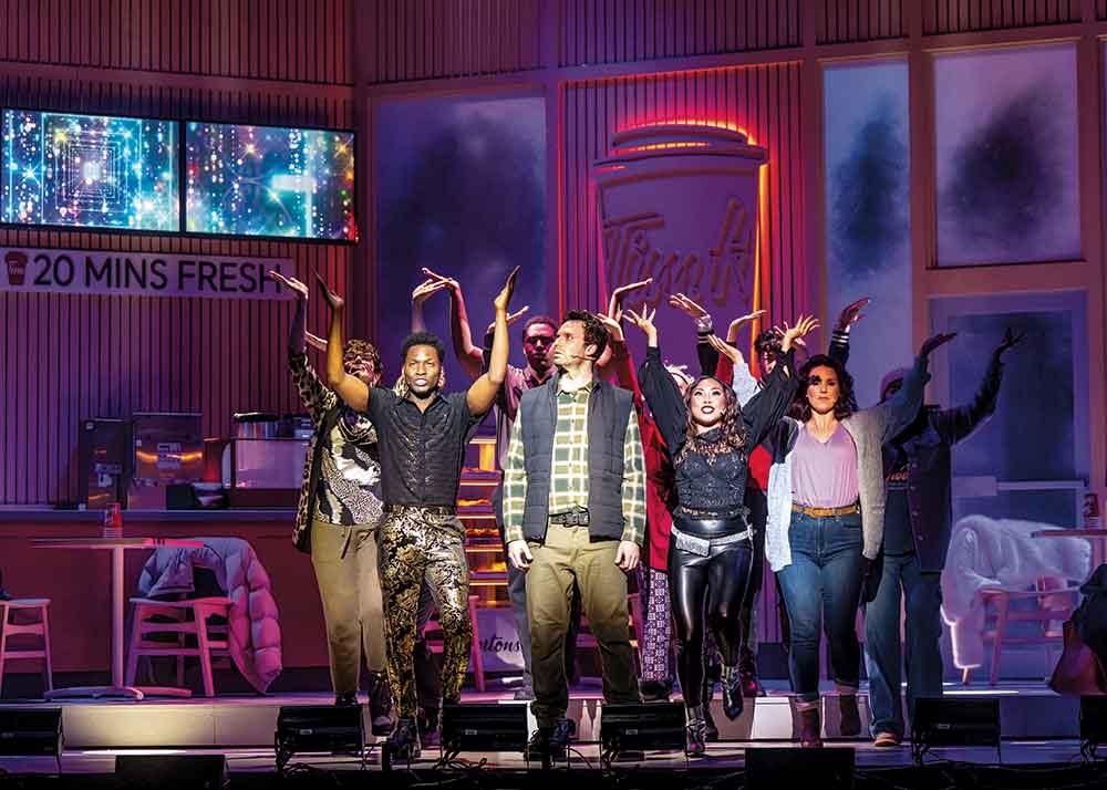 The Last Timbit on Crave. Pictured: The cast of The Last Timbit perform onstage at Toronto’s Elgin Theatre.