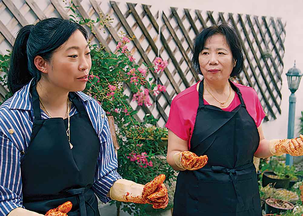 No Taste Like Home With Antoni Porowski on National Geographic. Pictured: Awkwafina (left) is among the celebrities appearing in the first season of No Taste Like Home.