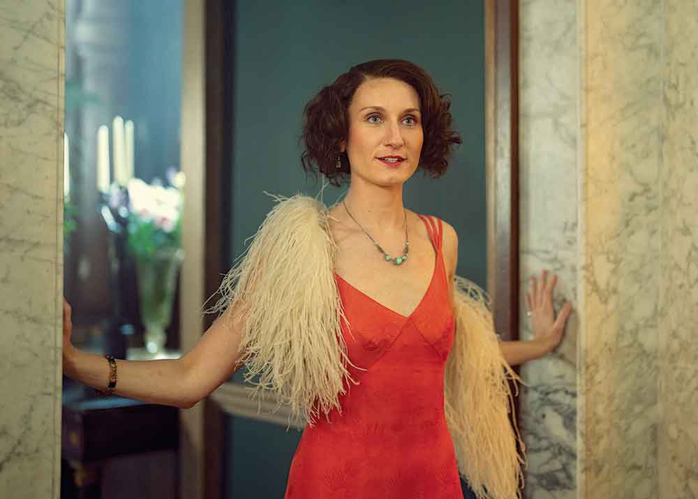 Outrageous on BritBox. Pictured: Bridgerton alum Bessie Carter plays eldest sister Nancy Mitford.