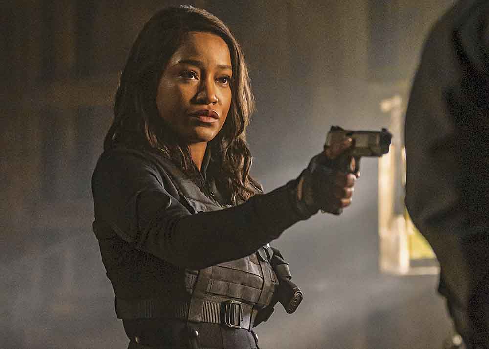 Nope breakout Keke Palmer plays Zoe, the suave mastermind who drags Russell and Travis into this madcap heist.