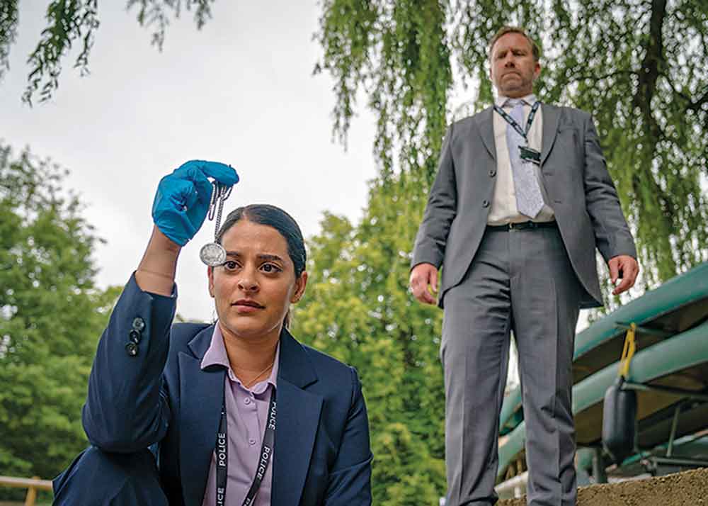 The Marlow Murder Club on Masterpiece on PBS. Pictured: DS Tanika Malik (Natalie Dew) and DS Brendan Perry (Phill Langhorne) continue to utilize the sleuthing skills of Judith and her pals.