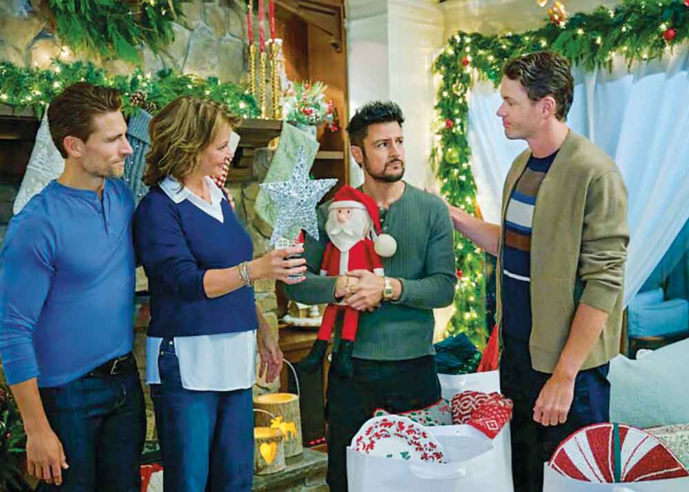 Three Wisest Men on W Network. Pictured: Andrew Walker, Margaret Colin, Tyler Hynes, Paul Campbell