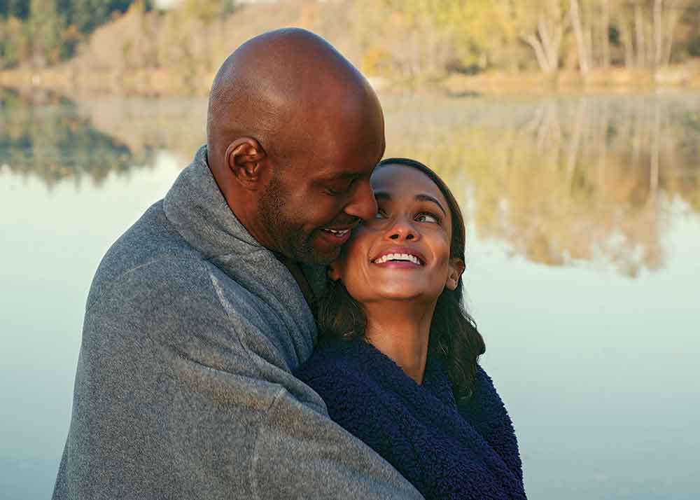 Virgin River on Netflix. Pictured: Fire chief Kaia Bryant (Kandyse McClure) has a hot-and-heavy romance with local chef Preacher (Colin Lawrence). But will a face from the past and a few nagging insecurities cool things off?