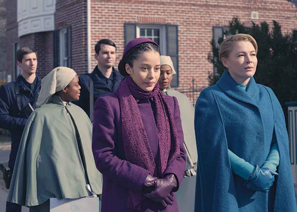 The Testaments on Disney+. Pictured: Agnes (Chase Infiniti) and her adoptive mother, Paula (Amy Seimetz).