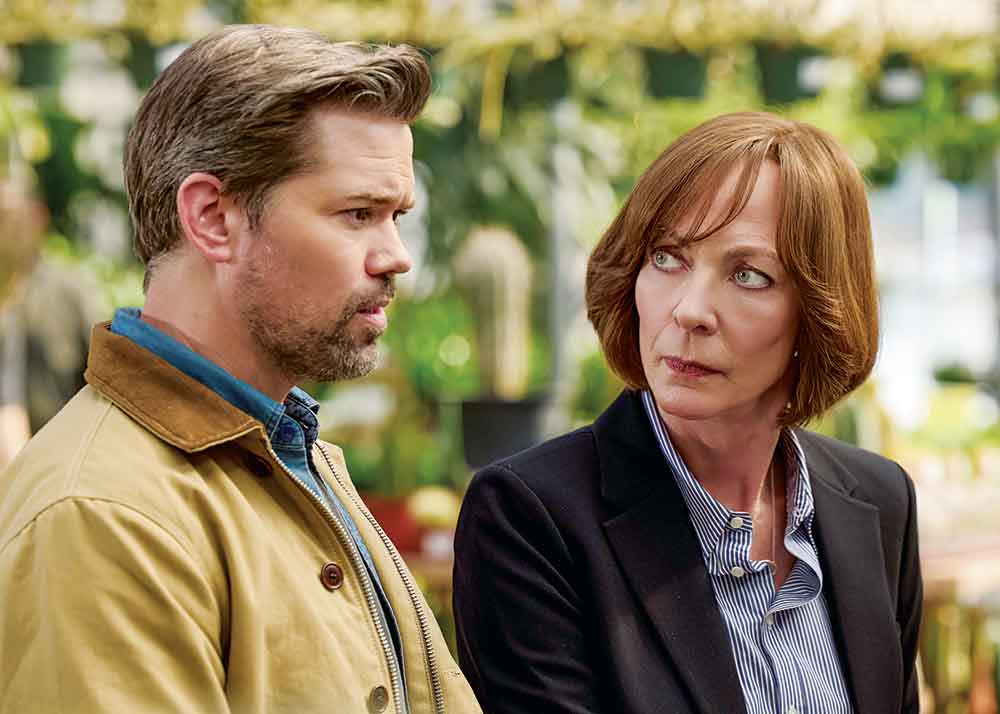 Miss You, Love You on Crave. Pictured: Jamie (Andrew Rannells), assistant to Diane’s (Allison Janney) son Tyler is sent to help plan funeral arrangements when Tyler is tied up with work.