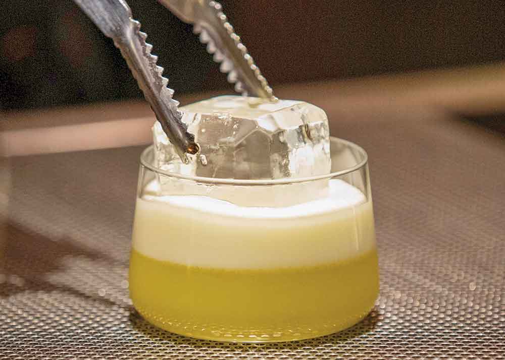 Best of the World With Antoni Porowski on Disney+. Pictured: A Japanese cold noodle drink is ready to serve at New York City’s Double Chicken restaurant.