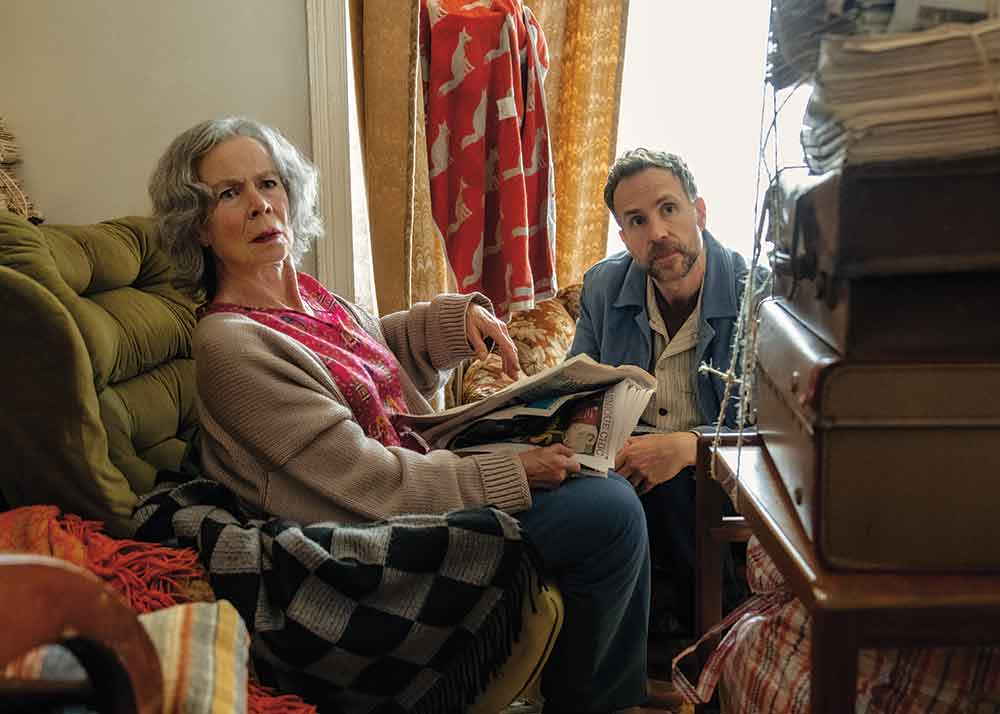 Trying on Apple TV. Pictured: Jason’s (Rafe Spall) training as a social worker brings him into the overstuffed abode of Harriet (Celia Imrie), an “upper-class hoarder.”