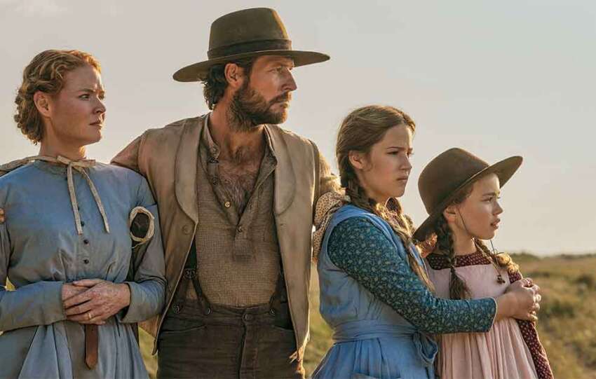 Little House on the Prairie on Netflix. Pictured: The Ingalls family (left to right): Caroline (Crosby Fitzgerald), Charles (Luke Bracey), Mary (Skywalker Hughes) and Laura (Alice Halsey).